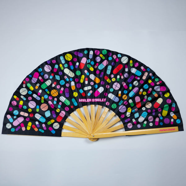 Take Your Meds bamboo clack fan with colourful medicine pill print. Large folding rave and festival fan perfect for Pride, drag shows and queer nightlife.
