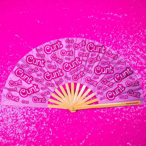 Pink CUNT bamboo clack fan by Harlem Starlet – bold statement hand fan for pride events, festivals, parties and queer nightlife.