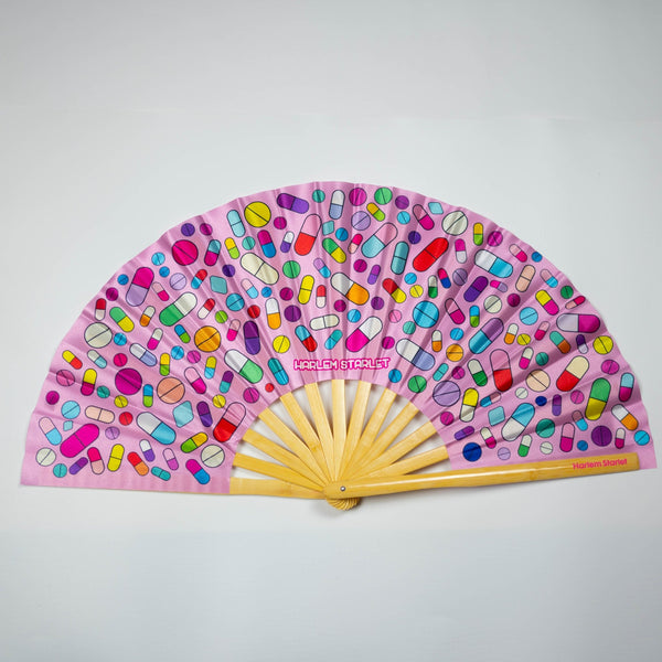 Take Your Meds bamboo clack fan with colourful medicine pill print. Large folding rave and festival fan perfect for Pride, raves, doofs, festivals drag shows and queer nightlife.